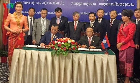 Министерства финансов Вьетнама и Лаоса активизируют взаимодействие - ảnh 1
